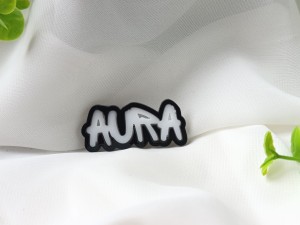 Napis AURA kolor z ramką  ML46